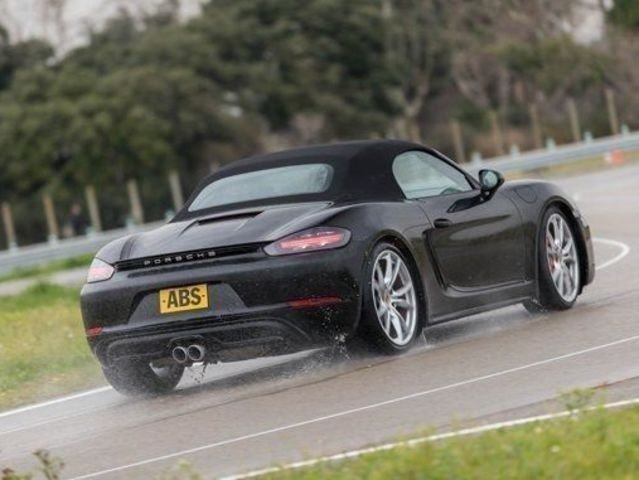 Where does the Porsche Boxster derive it's name?