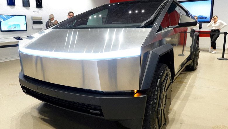 Why Elon Musk's Tesla Cybertruck will NEVER be available to buy in the UK: Premier League footballers' favourite car salesman reveals the truth