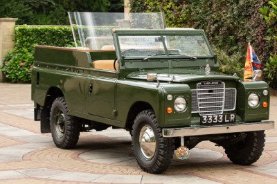 Queen Elizabeth's custom Land Rover with specially designed royal buttons to let her chauffeur know she was ready to drive on is set to sell for £80K