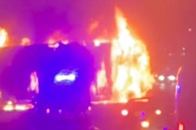 Terrifying moment Tesco lorry goes up in flames on the M25: Major road closed as fire crews battle inferno