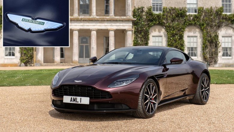 Aston Martin raises £211m from investors after profit warning