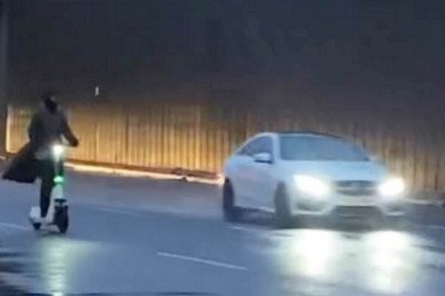 Shocking moment masked e-scooter rider travels down busy motorway at 10mph during Storm Darragh
