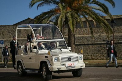 The Pontiff goes electric! Pope Francis makes first appearance in battery-powered 'G-Wagon popemobile' during trip to Corsica