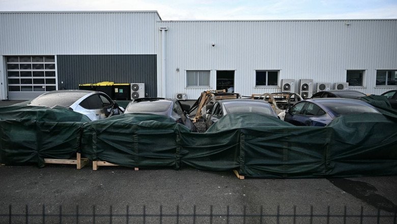 Tesla showroom is torched in arson attack in France with £550,000 of cars destroyed amid growing fury in Europe over Elon Musk's EU 'meddling' and Trump Ukraine funding row