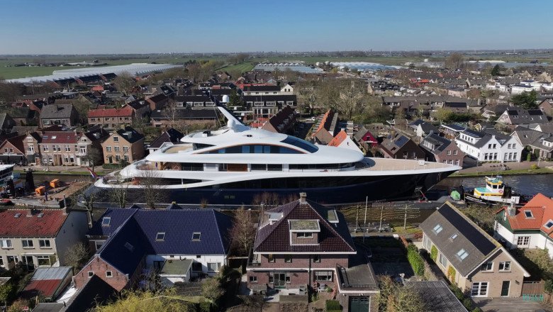 You'll Never Experience Stress Like Towing Lawrence Stroll's Enormous Yacht Through Tiny Dutch Canals