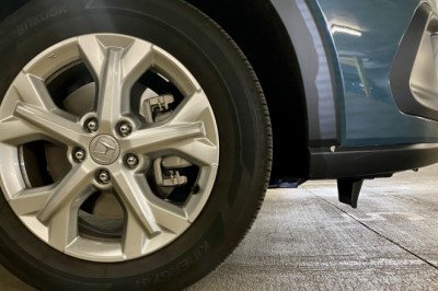 What That Random Plastic Flap In Front Of Your Wheels Actually Does