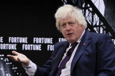 A Texan Ostrich Biting Boris Johnson At A Drive-Thru Safari Park Is Justice For His Awful Car Writing