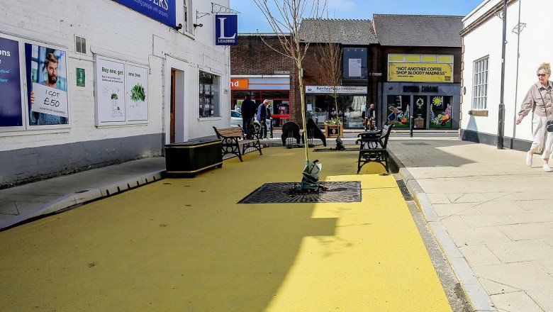 Where the streets have no shame! Families blast embarrassing town square after council painted it custard yellow
