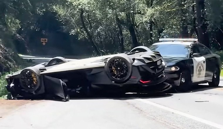 Cop Car Shoves Rolled-Over Lamborghini Off California Highway 9