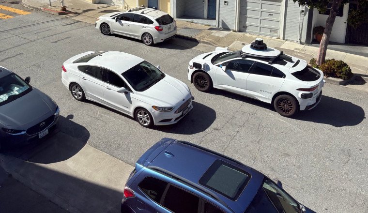 Seeking solitude and safety, riders flock to robotaxis driven by computers