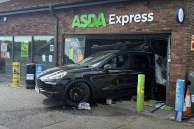 Police investigating after used car dealer’s stolen Porsche is used in shocking ram raid