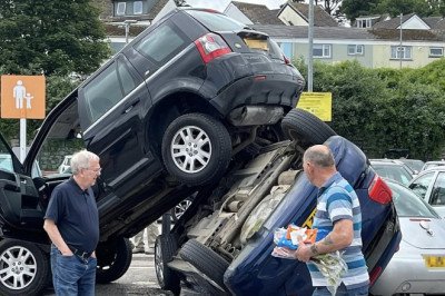 You can't park there! Land Rover ends up on top of another vehicle after Sainsbury's supermarket car park crash