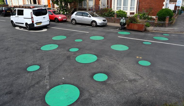 Locals baffled as mystery green spots appear on street overnight - but what are they for?