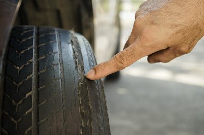Ever Wonder Why Your Tires Wear Out Faster On One Side? Here's Why