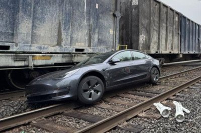 Tesla In 'Self-Drive Mode' Hit By Train After Turning Onto Train Tracks