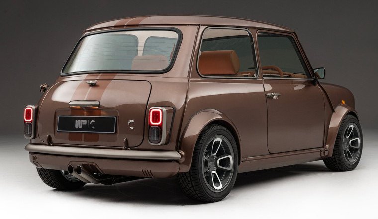 The classic Mini turned into a £75,000 hot hatch - and the first model built has been sold to... a model